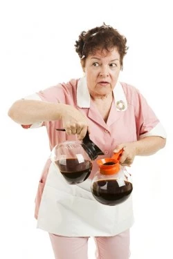 decaf_waitress-with-coffee-pots_image-250x375
